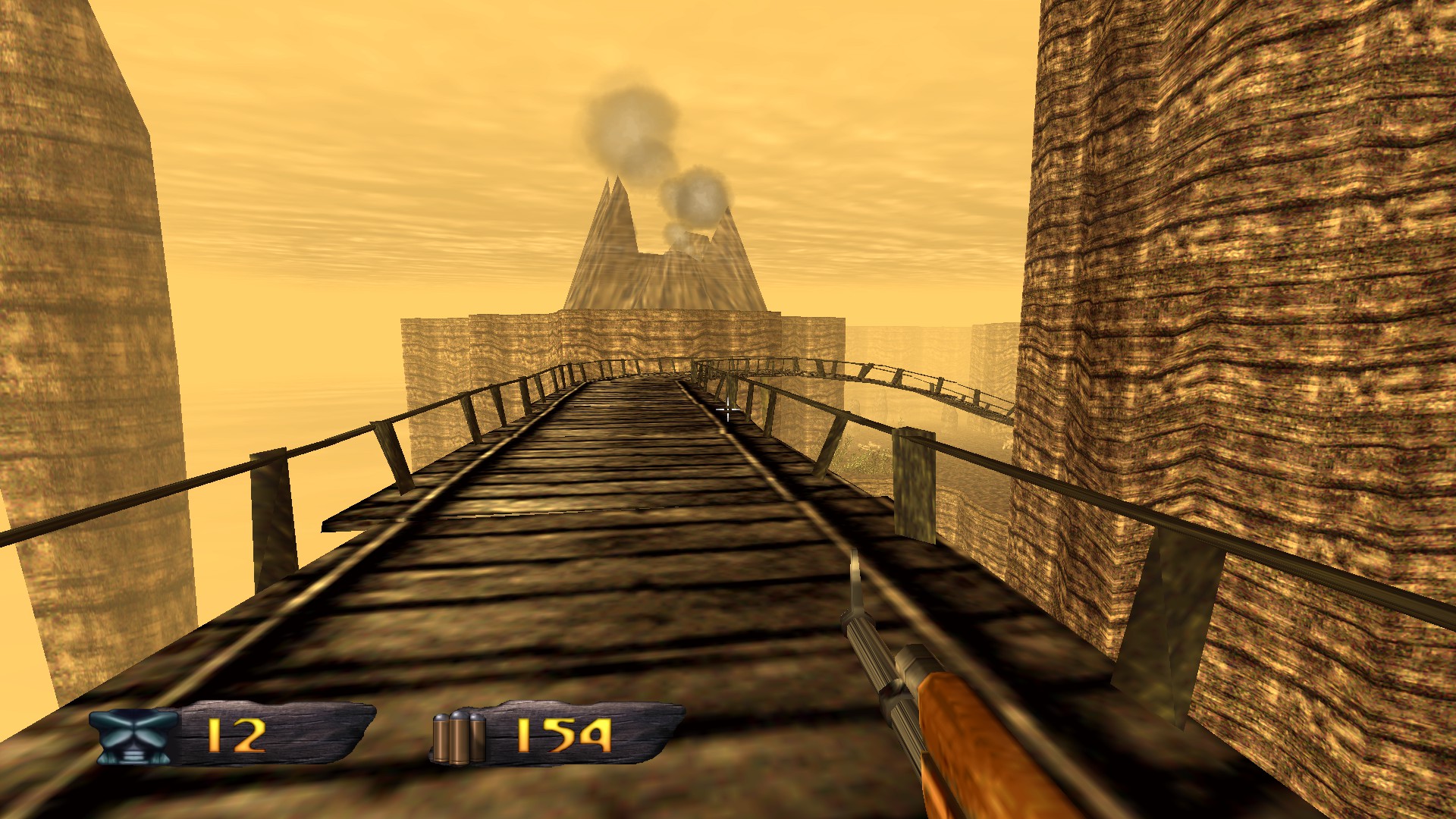 In-game screenshot of the arid volcano level, crossing a wooden bridge.